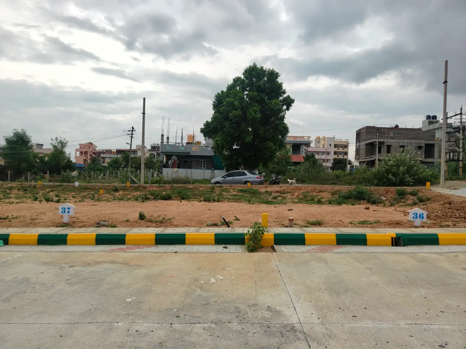 Samartha Layout — demarcated plots and internal road